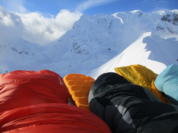 The University team snuggled up at their "high bivy" before a successful summit the next day.