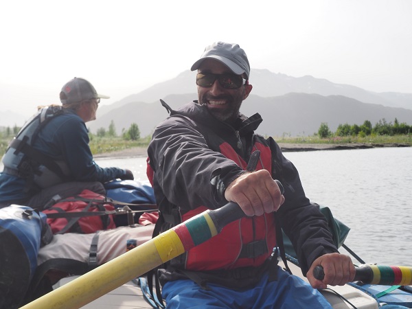 Fred, smiling as he enjoys some time on the oars on the Copper River!