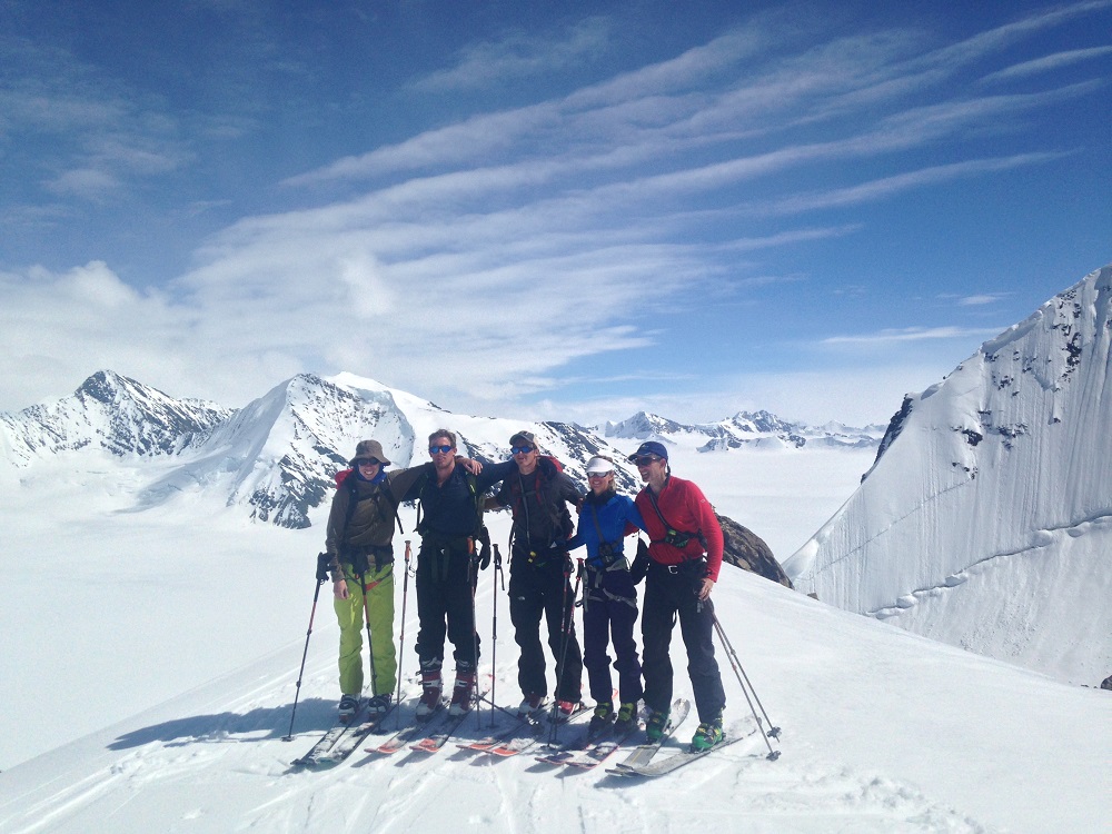happy skiers in alaska