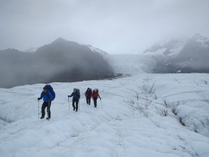 hikers on glacier