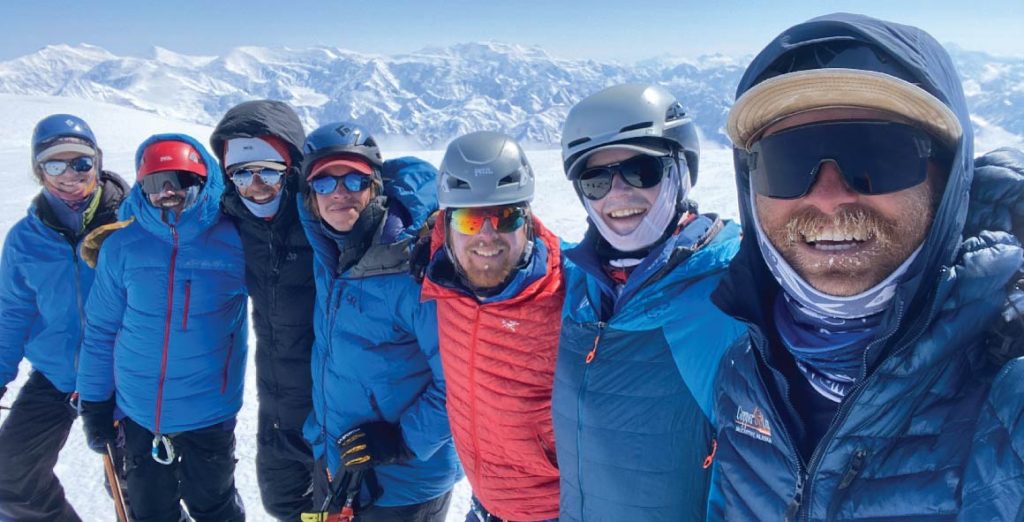 Climbing guides on summit of Mt. Bear Alaska