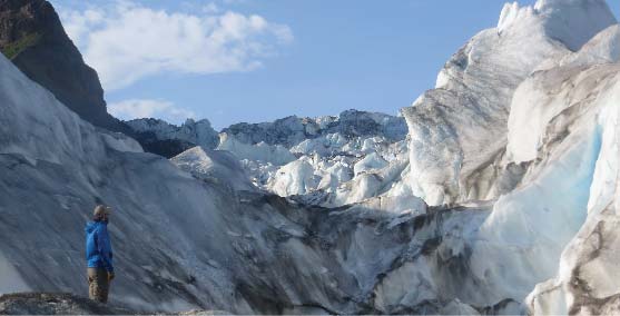 Man standing on the Kennicott Glacier in Wrangell - St. Elias National Park