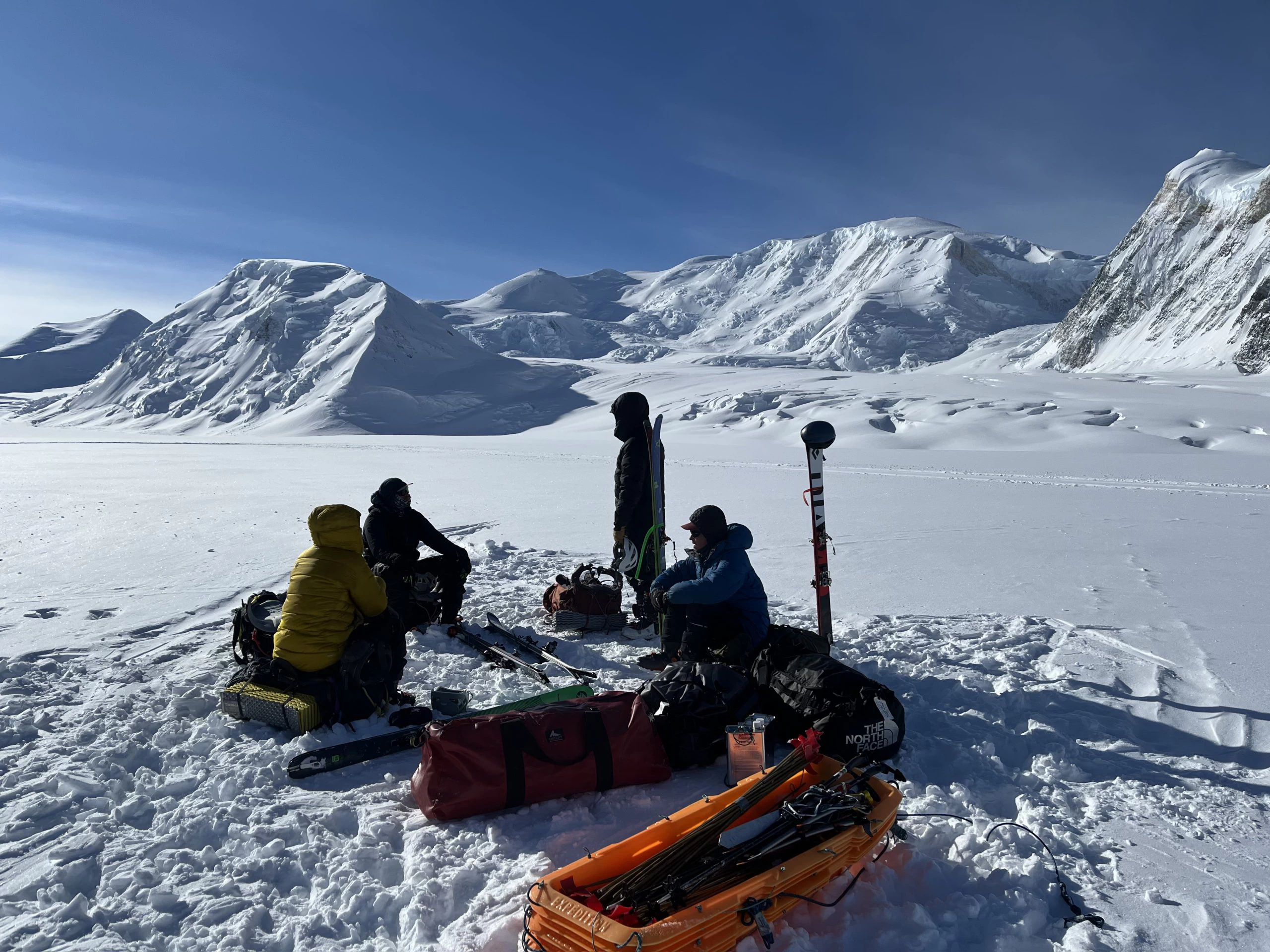 Guides waiting for pick up with Mount Bear in the background