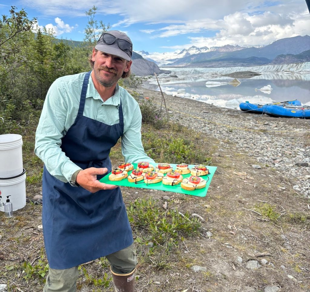 making dinner on river bar
