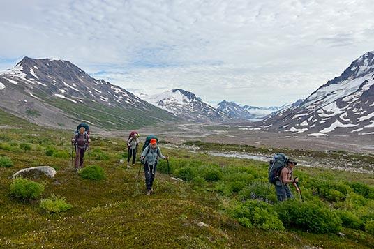 Backpackers move through Wrangell - St. Elias National Park