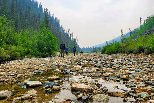 People hiking on rocks