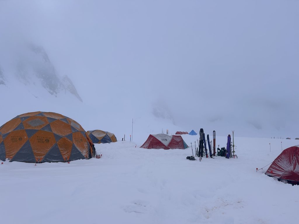 Foggy weather descends on a backcountry ski camp in the Wrangells