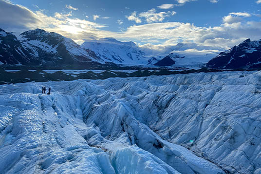 Mt. Blackburn and the Kennicott Glacier light up in an evening blue hue