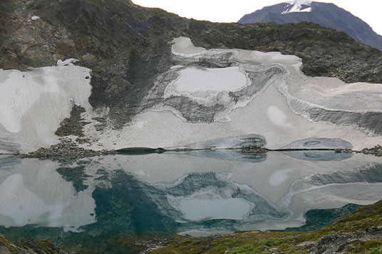 A perfect mirror reflection in an alpine lake
