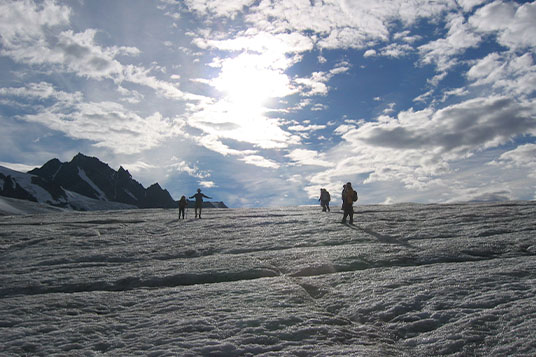Hikers on a glacier in Wrangell - St. Elias National Park