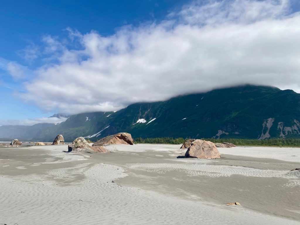 Huge sandy beach with mountains in the background on the Copper River